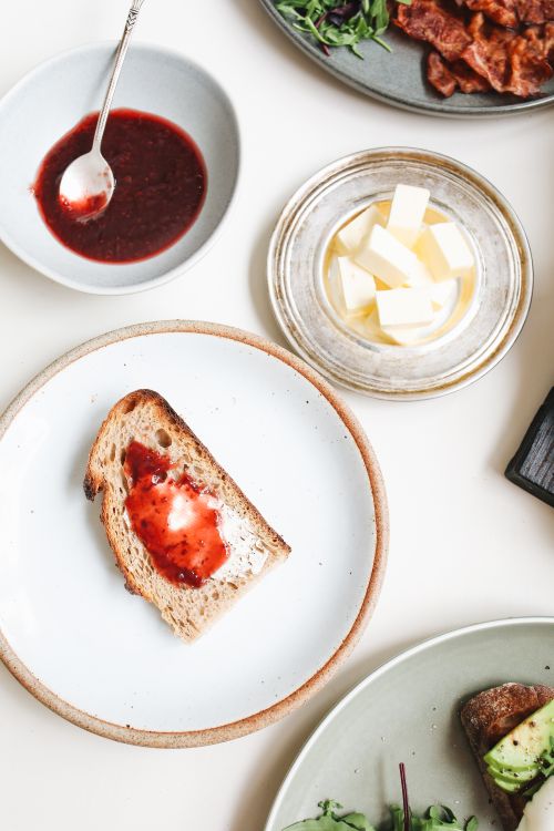 Free Beautiful breakfast setting with toast and jam. Perfect for food lovers. Stock Photo