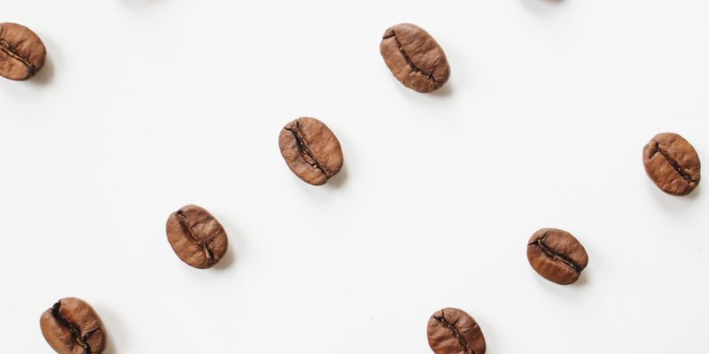 Coffee beans spread out showing quality and consistency