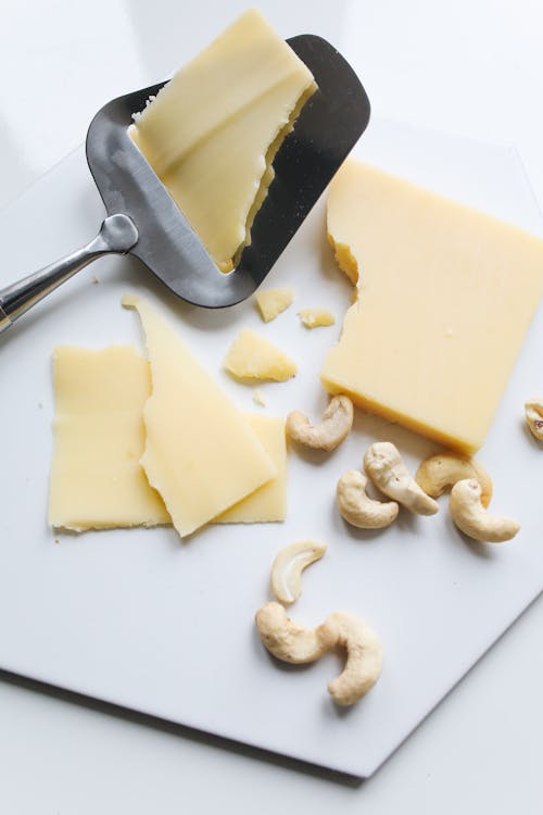 Photo Of Sliced Cheese On Spatula