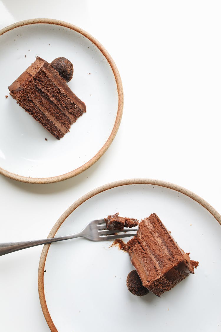 Photo Of Sliced Cake On Ceramic Plate