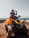 Woman Sitting on Quad