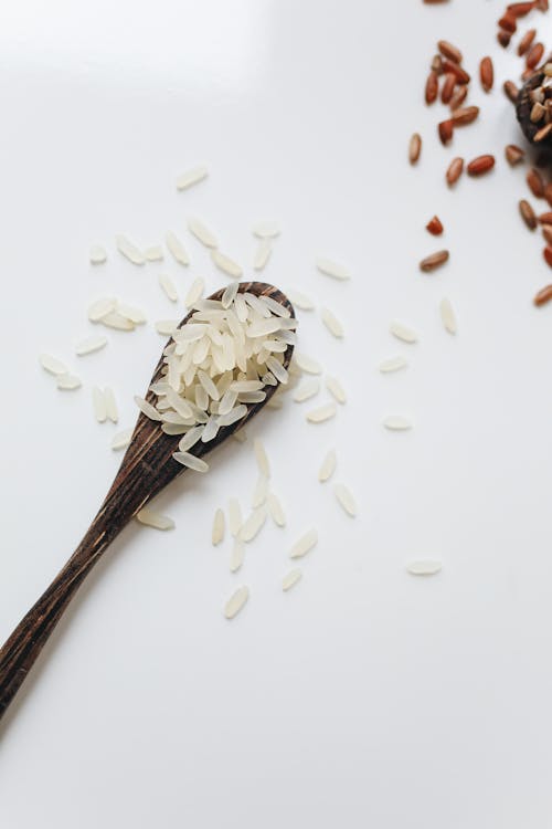 Photo Of Rice On Wooden Spoon 