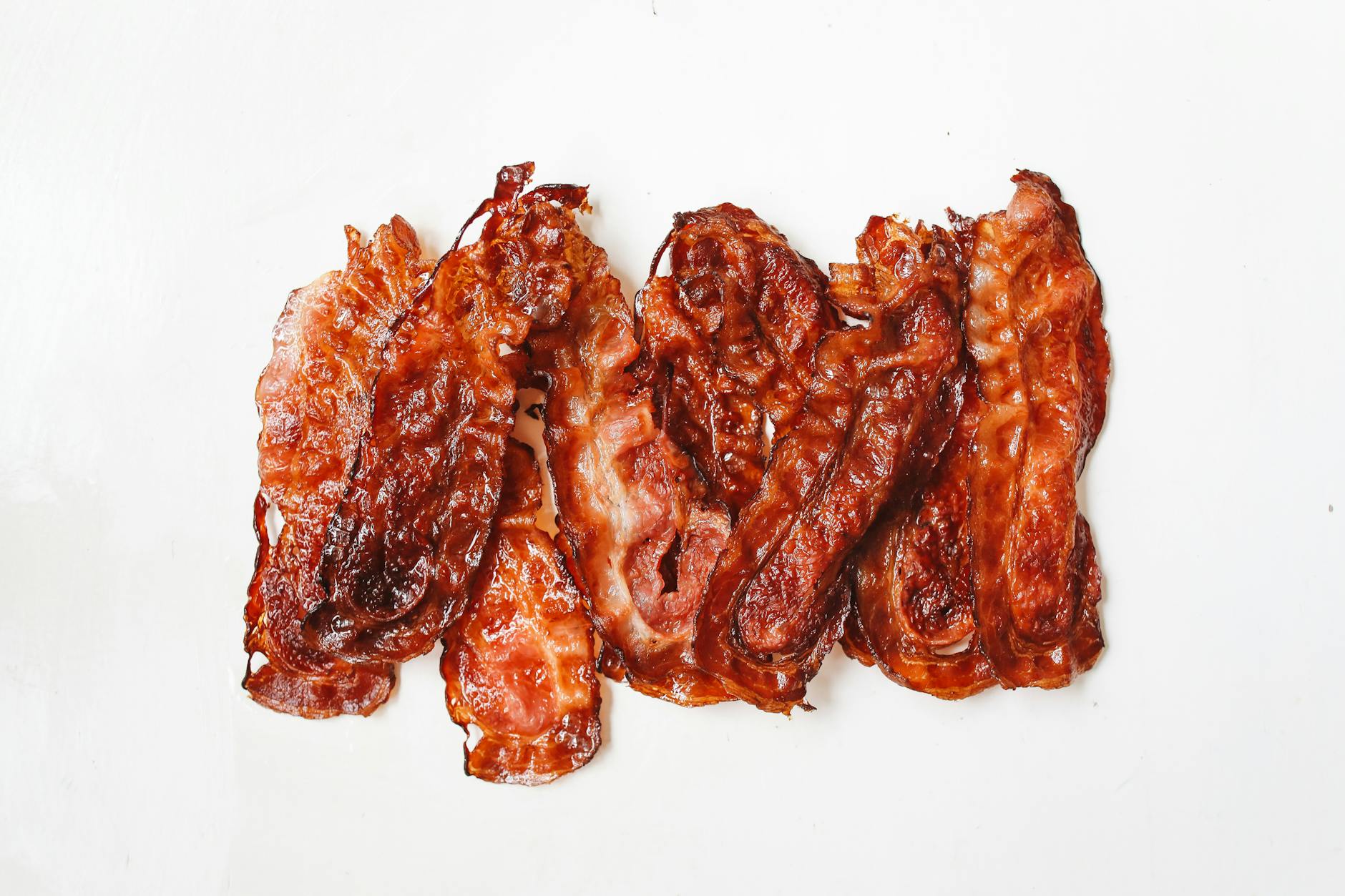 https://www.pexels.com/photo/fried-strips-of-meat-on-white-surface-4110378/