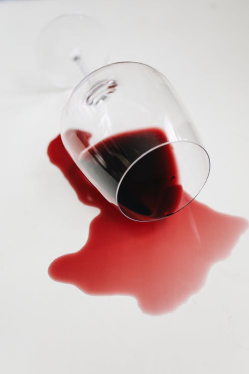 Free Spilled Red Wine From A Glass Stock Photo
