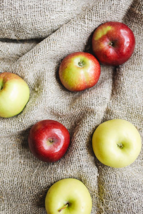 Free Photo Of Apple On Top Of Rice Sack  Stock Photo