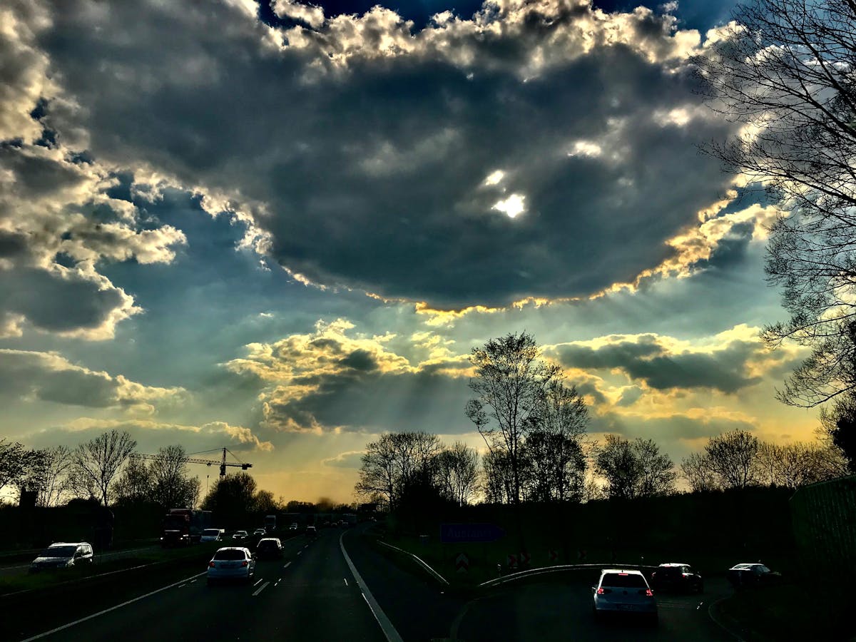 Three yogurt bowls with different toppings like berries, nuts, and chocolate