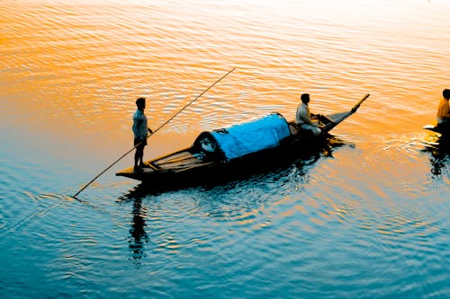 Photo Of People On A Boat 