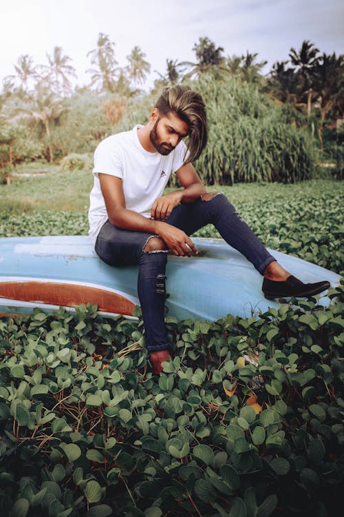 Free Photo Of Man Wearing Denim Pants Stock Photo