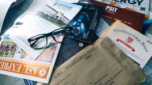 Free stock photo of at table, pamphlet, spectacles