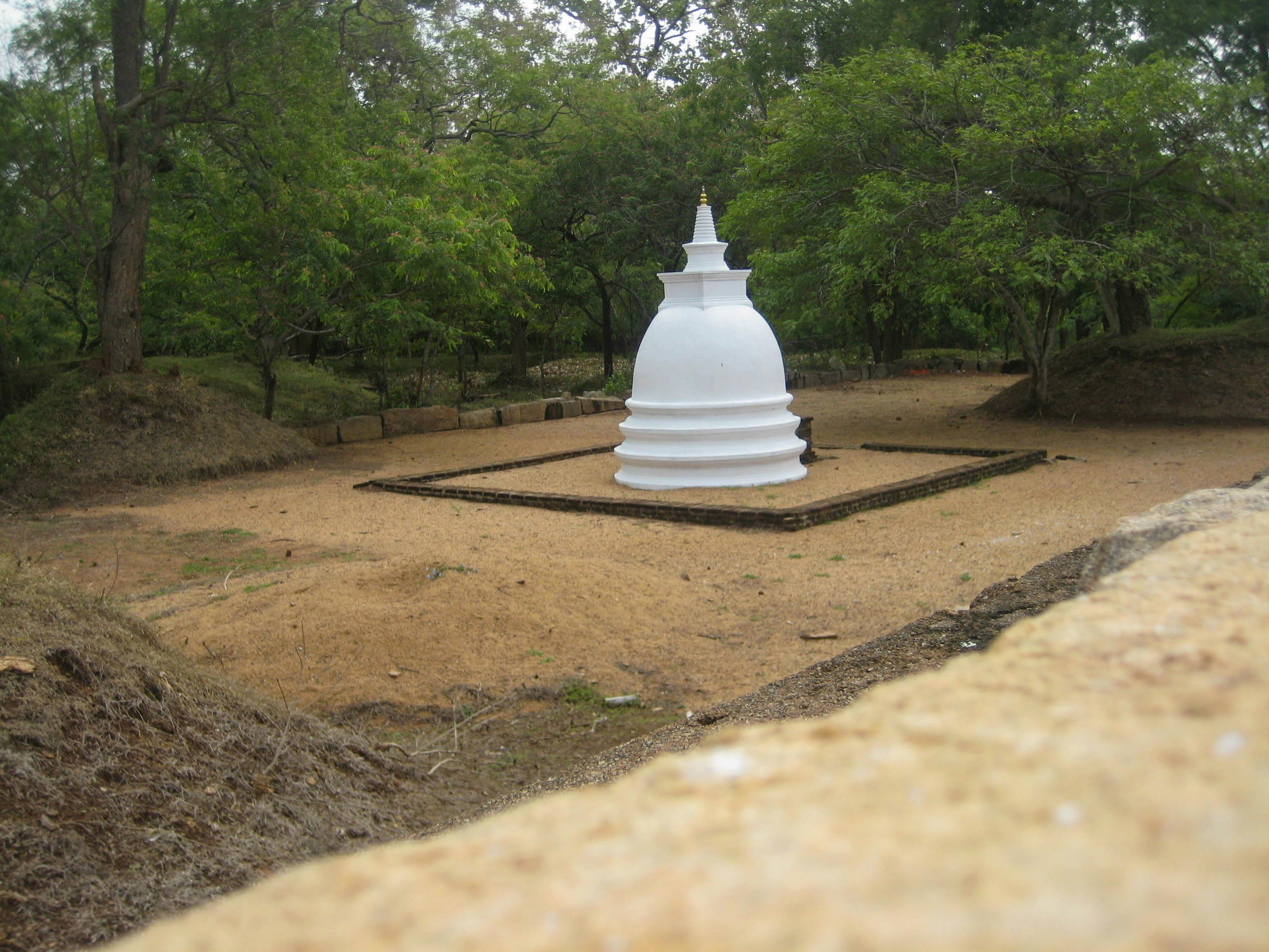 Person relaxing indoors playing a cozy game on a controller