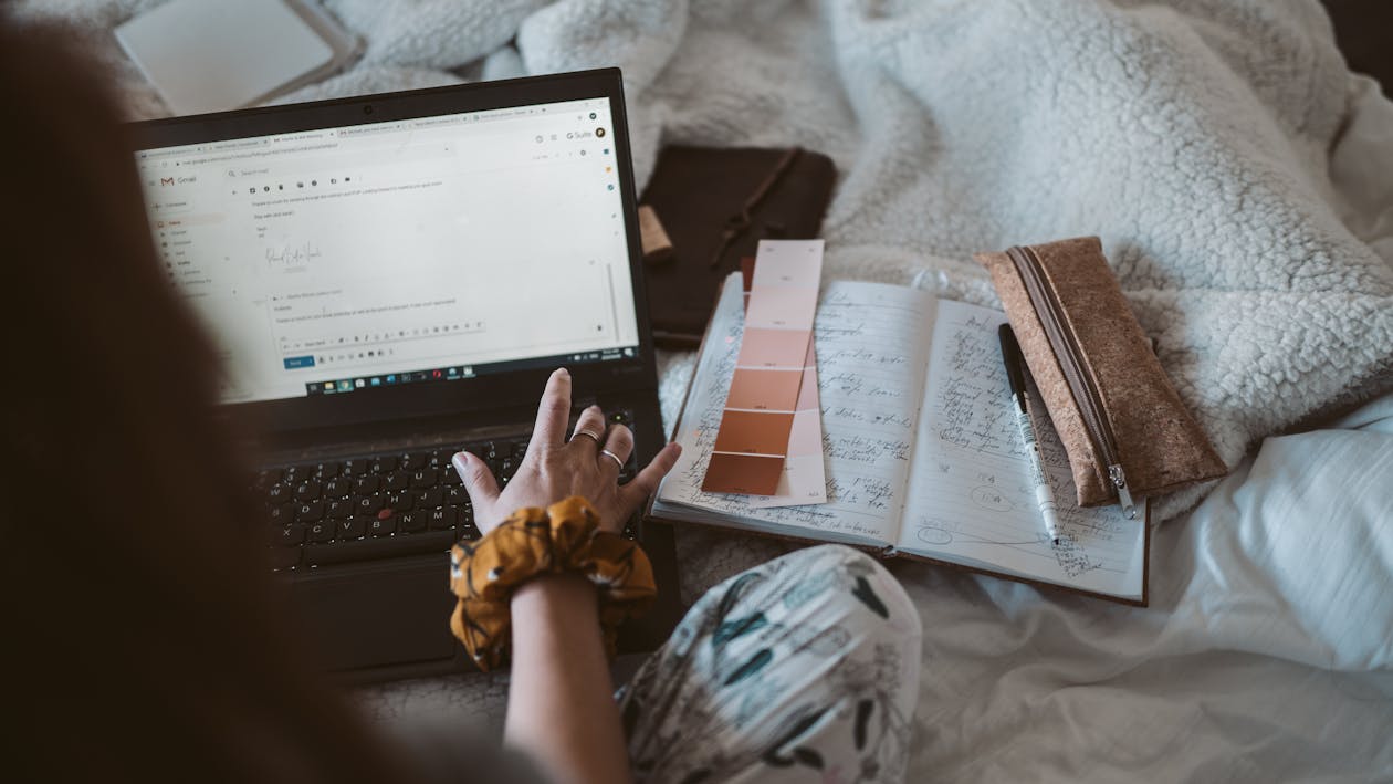 Free Photo Of Person Using Laptop Stock Photo