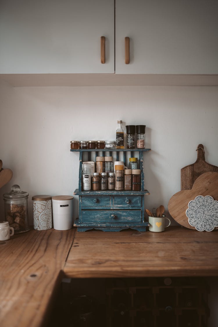 Blue Wooden Cabinet On A Wooden Countertop