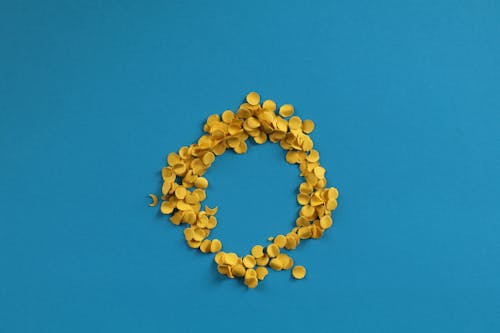 Yellow Confetti On Blue Background