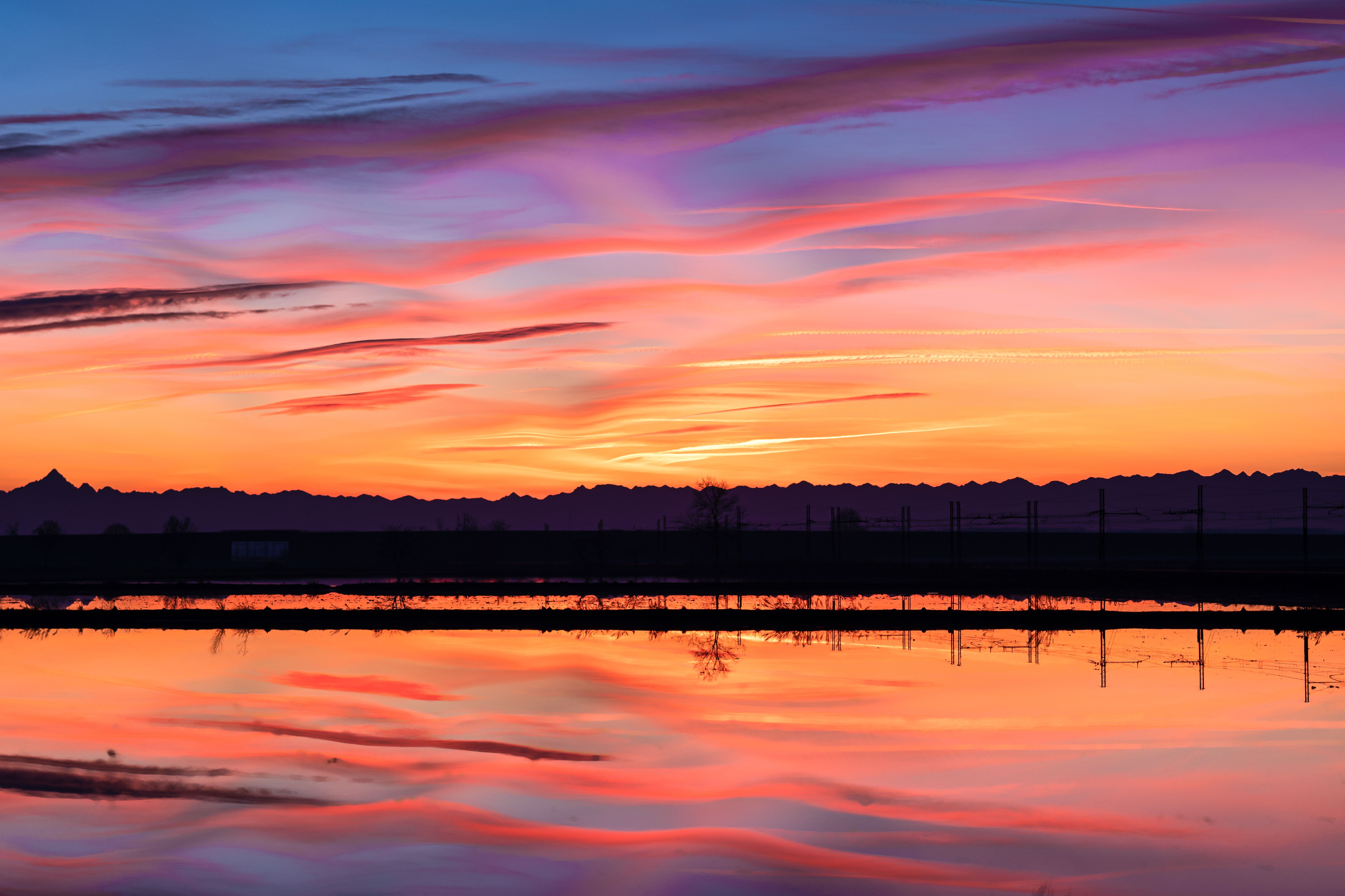 A vibrant sunset representing natural biological rhythms