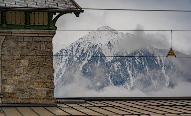 Snow Covered Mountain View From Rooftop