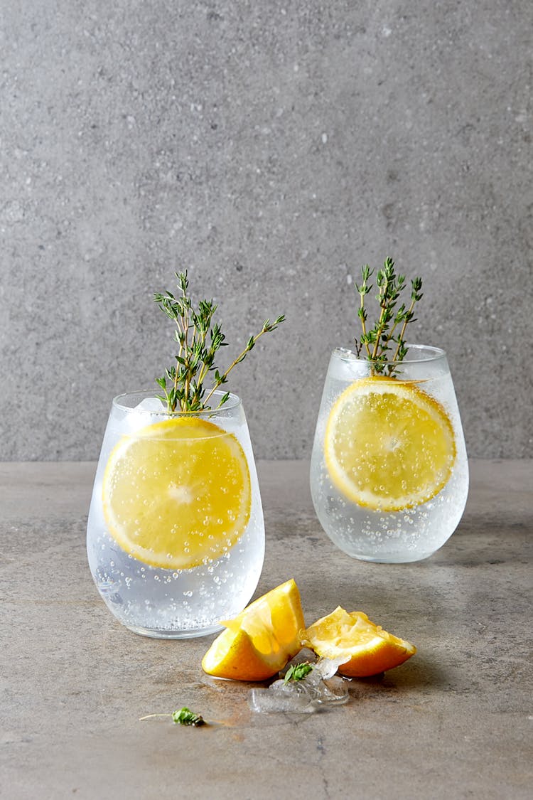 Gin And Tonic Cocktail Drinks In Clear Glasses