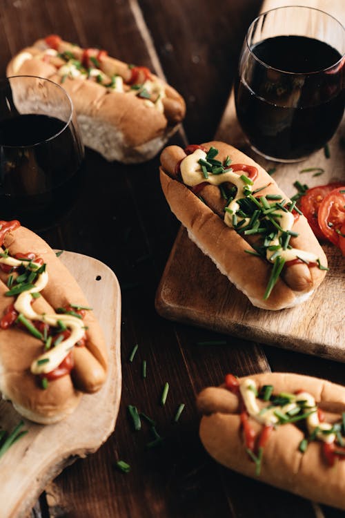 Free American Style Hot Dogs with Sauce and Spring Onion on Top Stock Photo