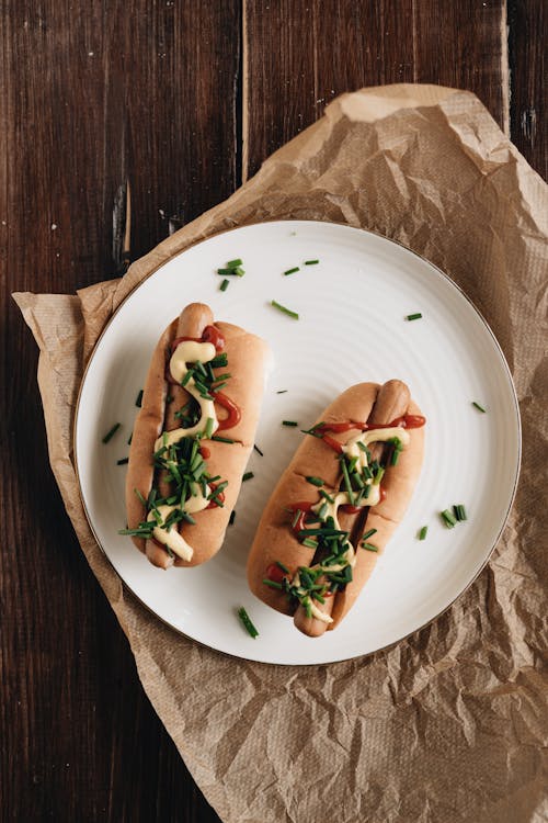 Free Hot Dogs on Ceramic Plate  Stock Photo
