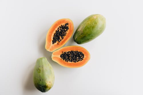 Close-Up Photo Of Sliced Papaya