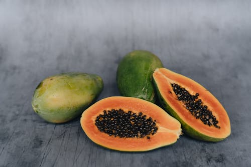 Close-Up Photo Of Sliced Papaya