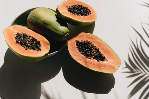 Close-Up Photo Of Sliced Papaya