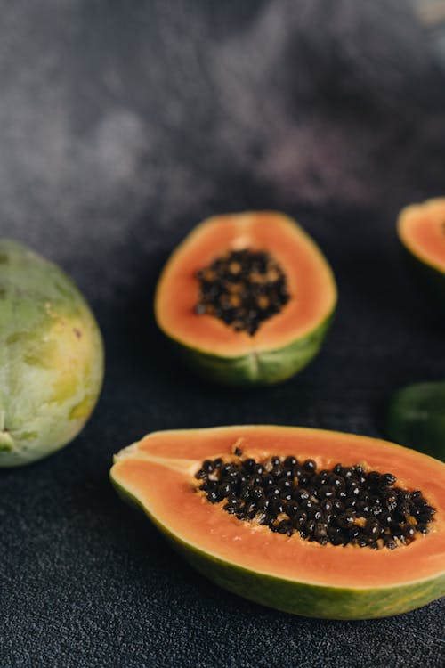 Close-Up Photo Of Sliced Papaya