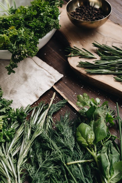 Free Photo Of Assorted Herbs On Wooden Surface Stock Photo