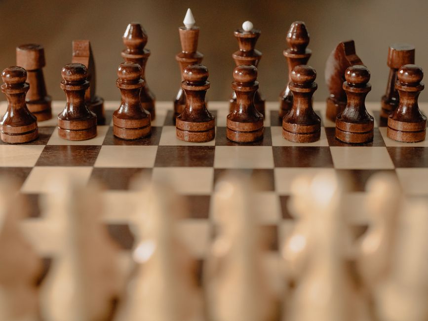 chess pieces wooden board
