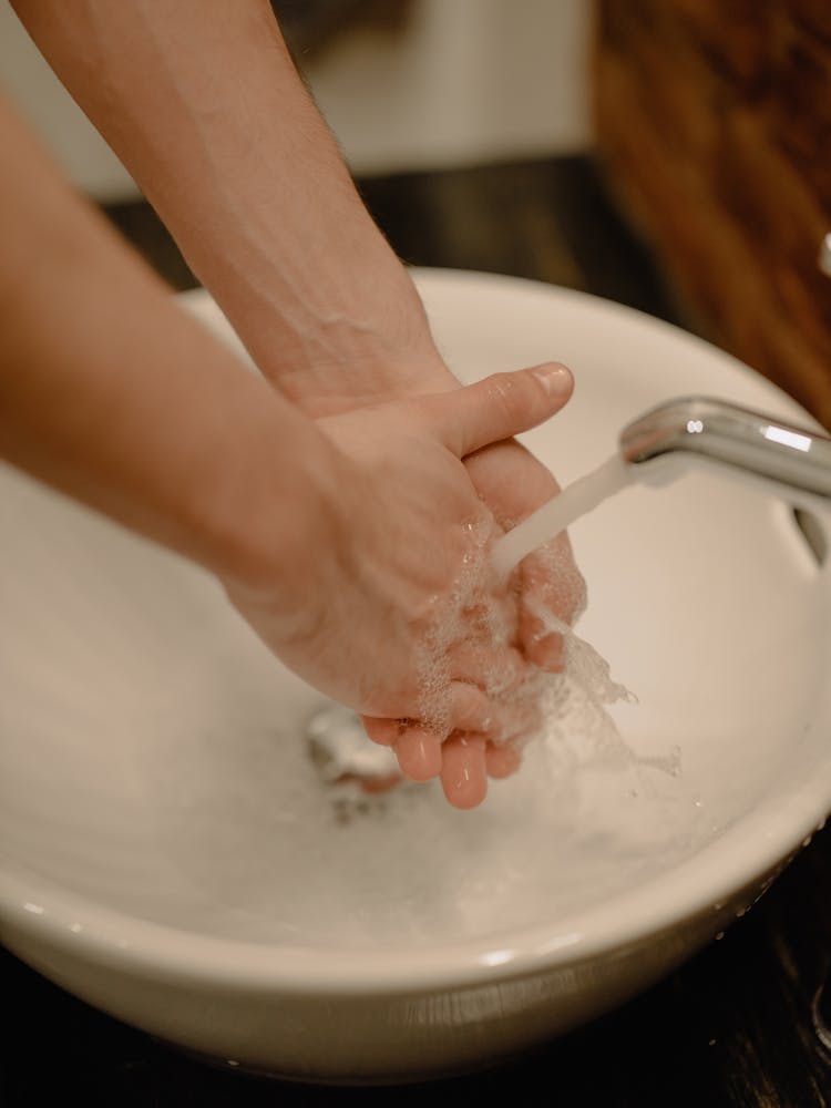 Person Washing His Hands