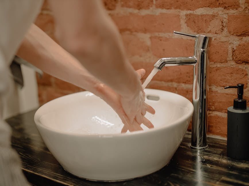 Person Washing Hands