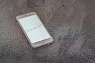 Iphone 6 on Gray Textile