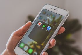 Close crop of a mobile interface in hand — Castorly Stock on Pexels