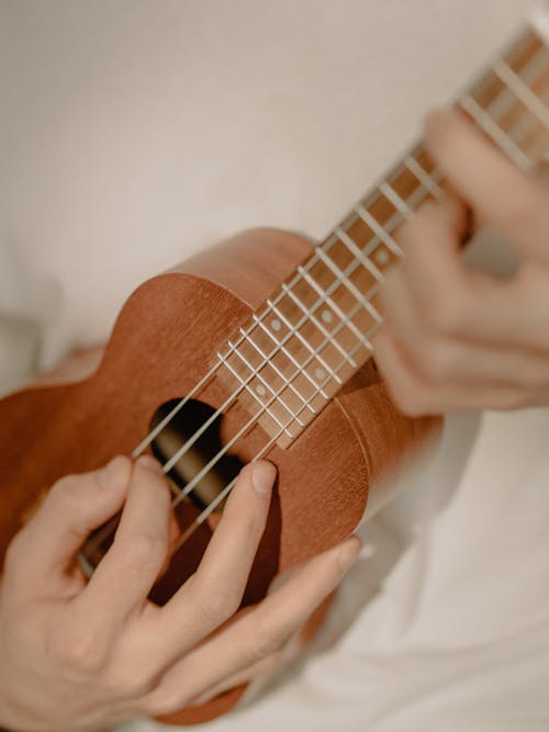 Free Person Holding Brown Acoustic Guitar Stock Photo