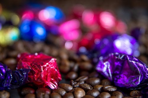Free Pink And Purple Wrapped Candies In Close-up View Stock Photo