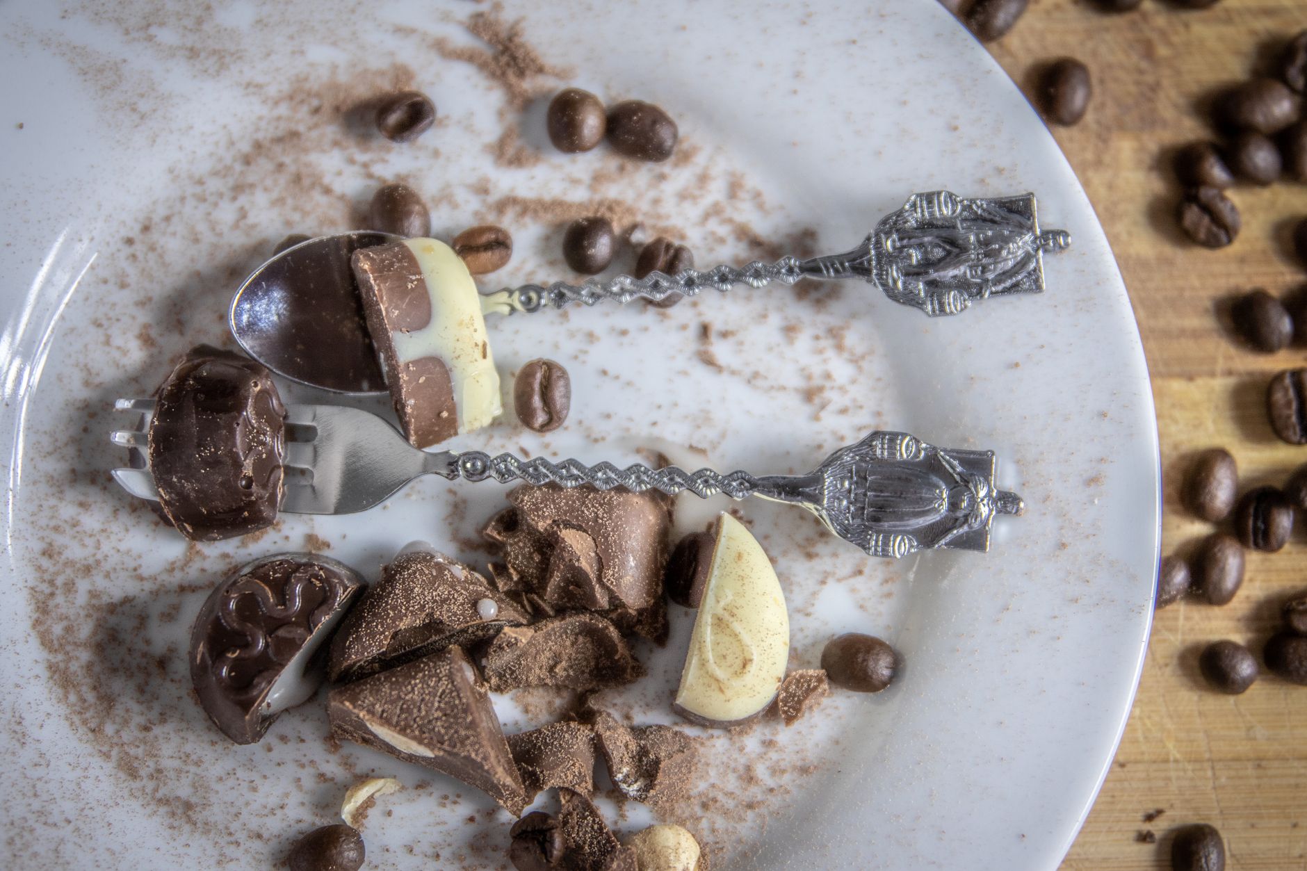 Dark chocolate and blue cheese arranged on a wooden board
