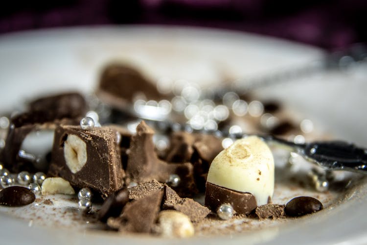 Chocolate Candy On White Ceramic Plate