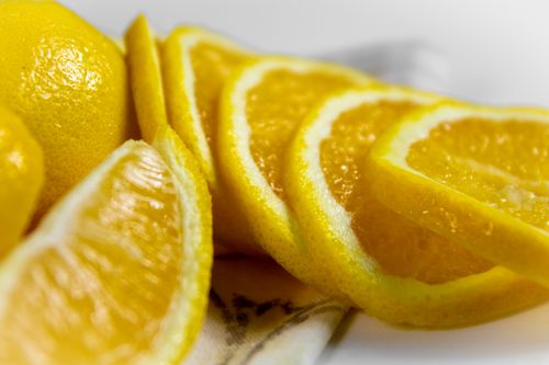 Free Vibrant close-up image of sliced oranges, showcasing fresh and nutritious fruit. Stock Photo