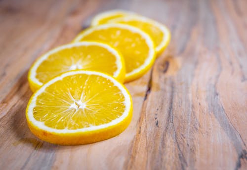 Foto profissional grátis de alimento, fatias de laranja, fechar-se