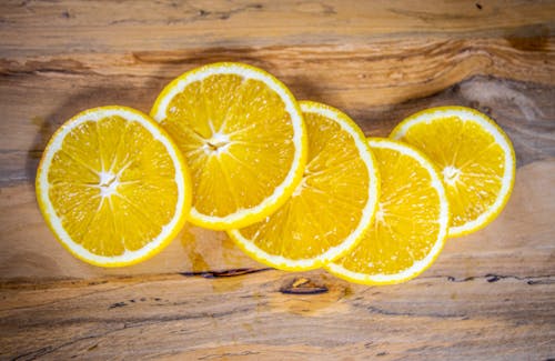 Foto profissional grátis de alimento, fatias de laranja, fechar-se