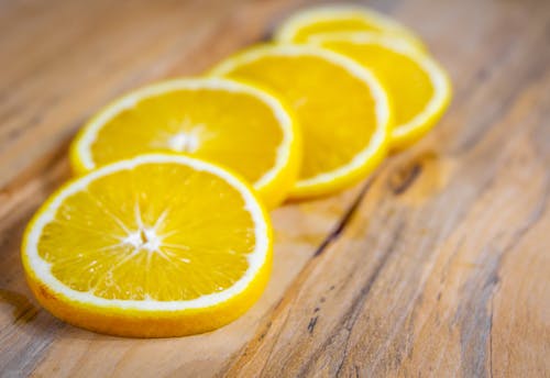 Foto profissional grátis de alimento, fatias de laranja, fechar-se