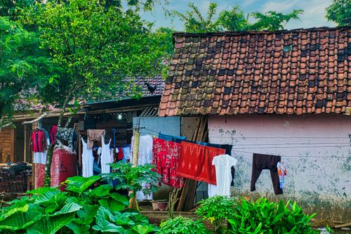 Free Charming village house with drying laundry in Banten, Indonesia's countryside. Stock Photo