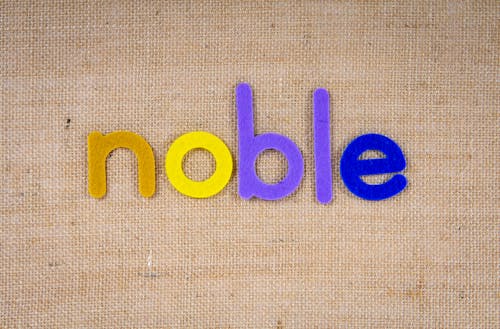 The Word Noble on a Woven Surface