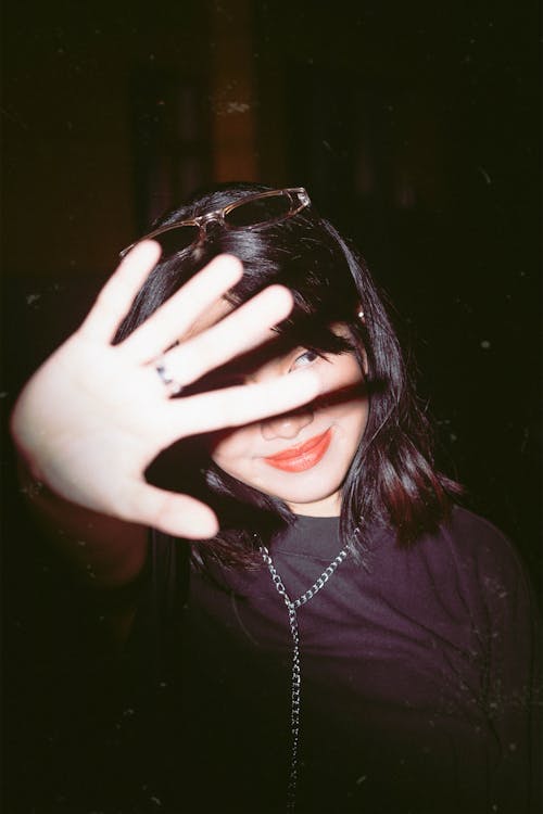 Photo Of Woman Covering Her Face