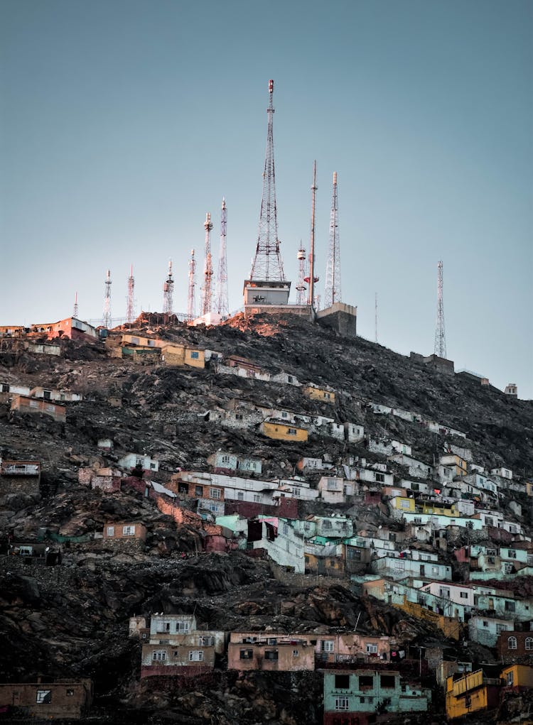 Power Station On Top Of Hill With Town