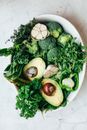 Green Vegetable on White Ceramic Plate