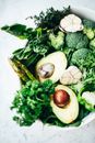Green Vegetable on White Ceramic Plate