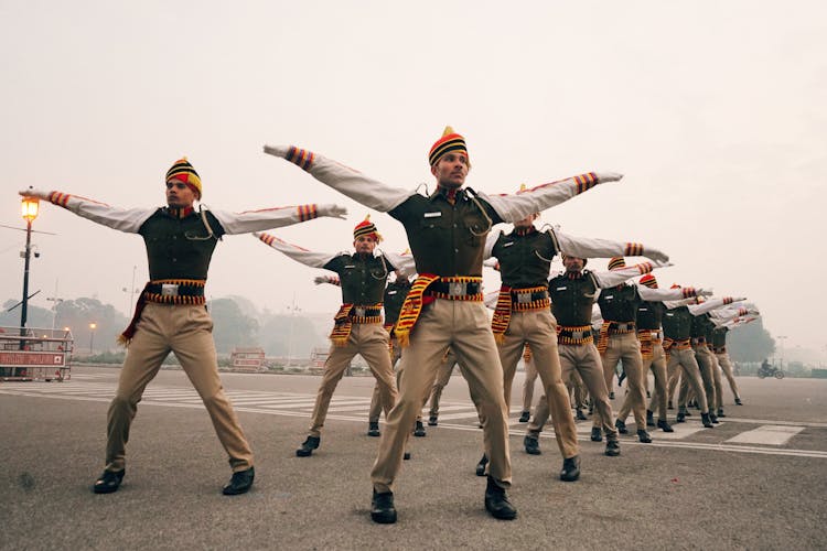 Group Of Ethnic Military Men During Exercising