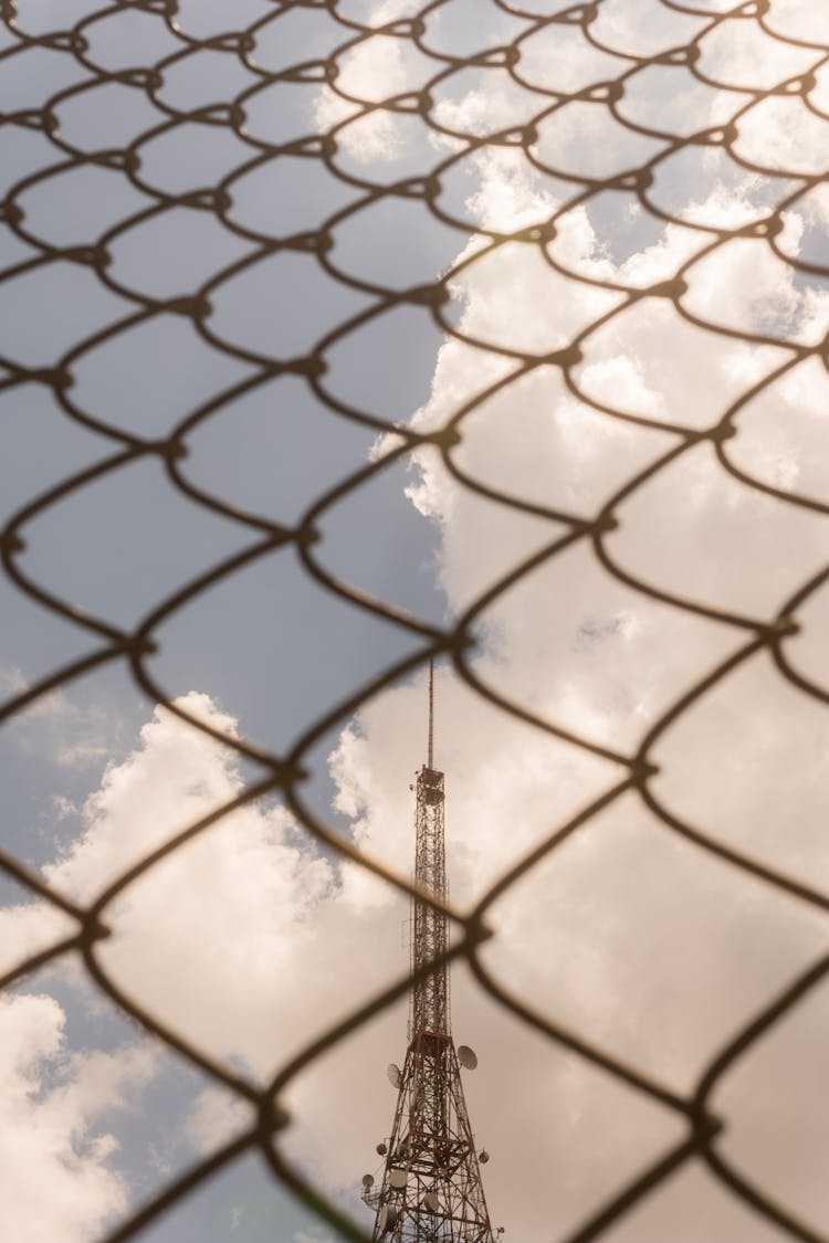 Low Angle Shot Of A Metal Fence