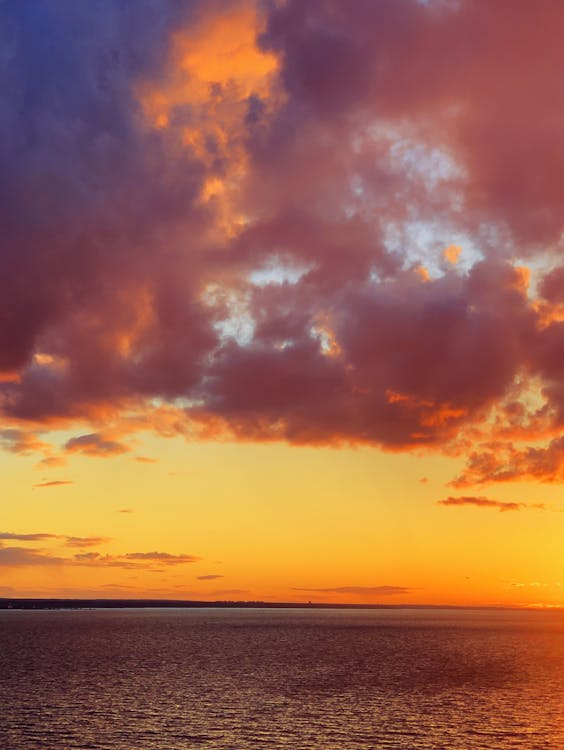 Scenic View Of Beach During Sunset