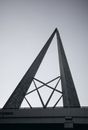 Modern building polygonal shaped facade under sky in city